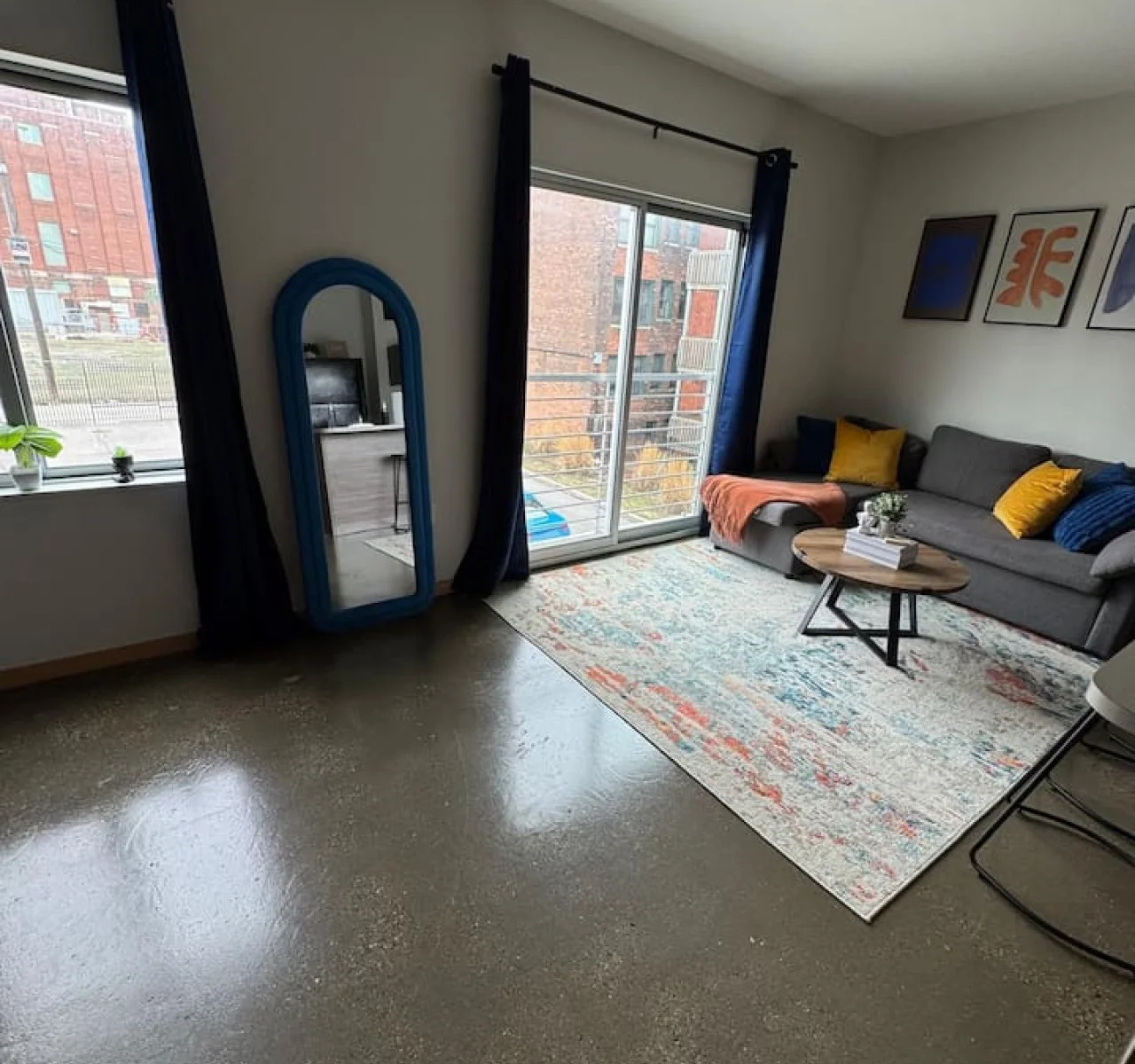 Spacious living room with stylish decor, perfect for unwinding after a day of exploring the local area.