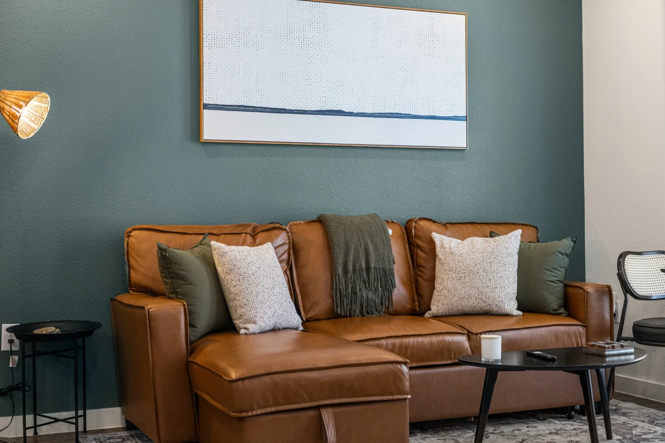 You feel a sense of peace as you step into the living room , with its inviting decor and soothing tones.