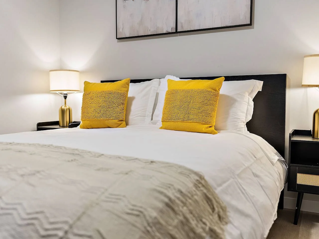 The bedroom offers a luxurious retreat, with a bed that promises restful nights and a room that feels like a private oasis.