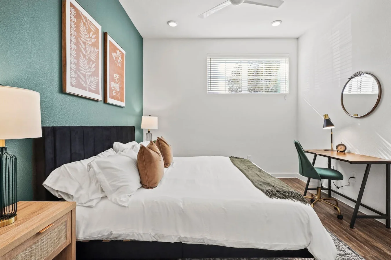 The bedroom offers a luxurious retreat, with a bed that promises restful nights and a room that feels like a private oasis.