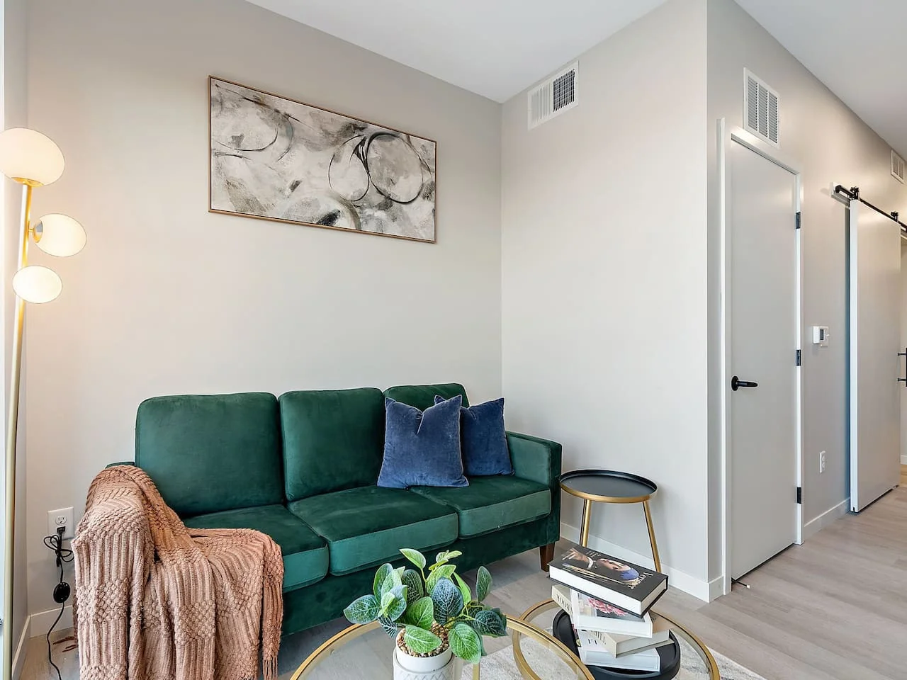 As you take a seat in the living room, the comfortable furniture and tasteful design make it easy to unwind.