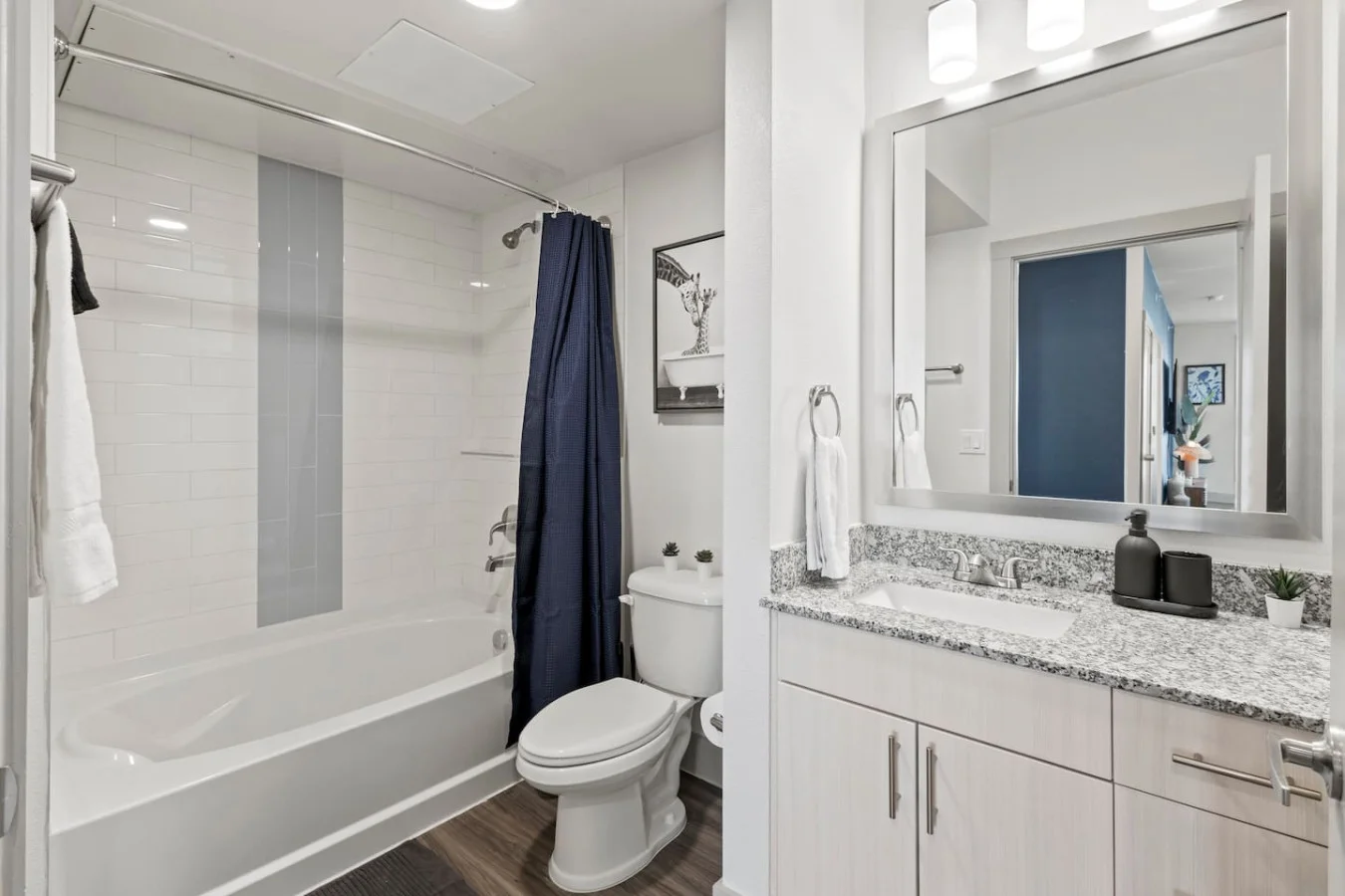 You feel a sense of calm as you enter the bathroom, where the thoughtful design and high-quality materials create a serene environment.