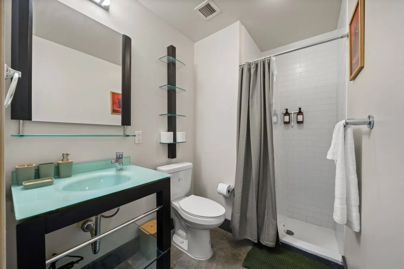 Second full-bathroom has a shower stocked with shampoo+conditioner+body wash.