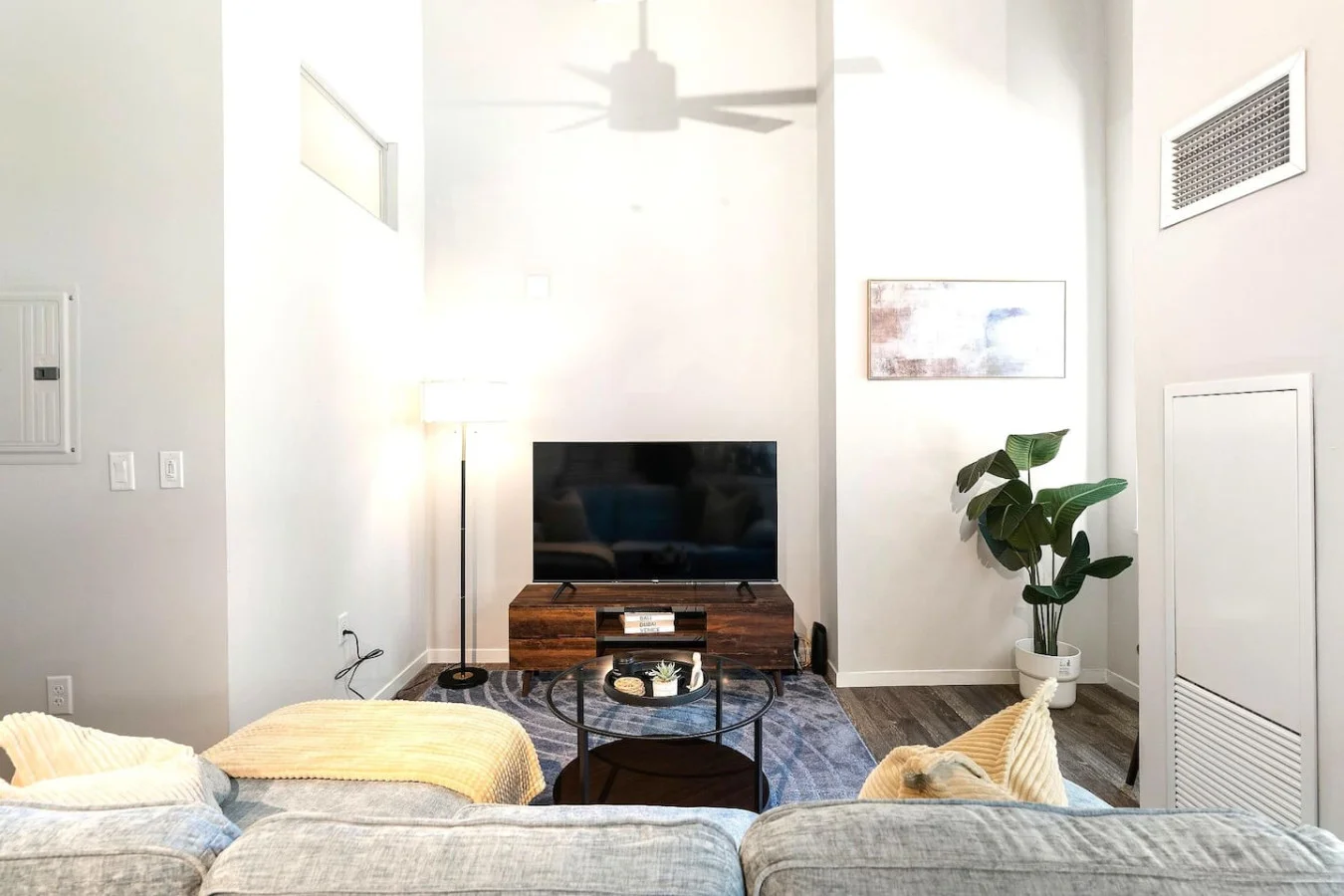 Relax in this warm, inviting space with warm accents and cozy furnishings. You’ll love unwinding on the plush sofa, enjoying or streaming your favorite shows in a serene atmosphere