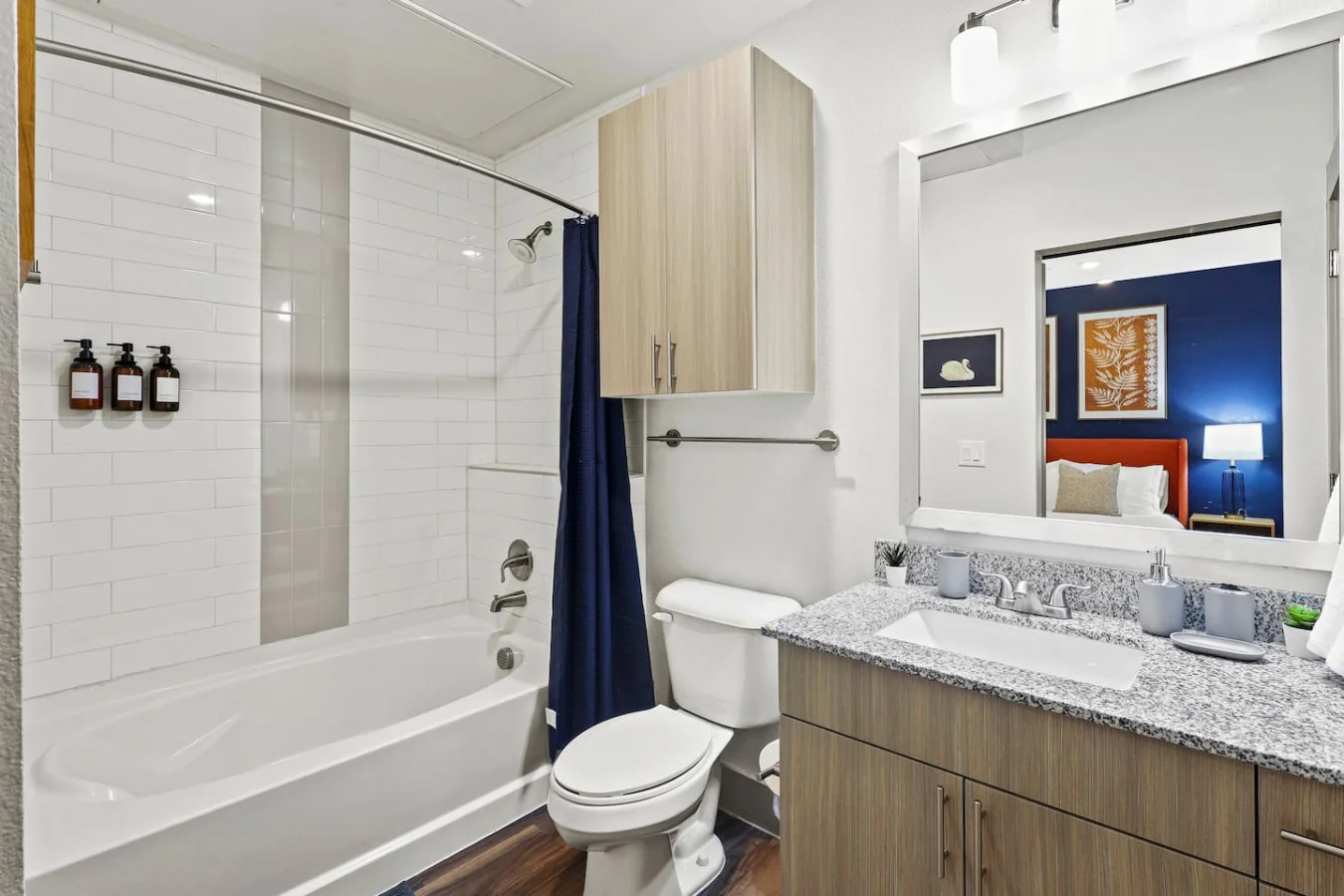 You feel a sense of calm as you enter the bathroom, where the thoughtful design and high-quality materials create a serene environment.