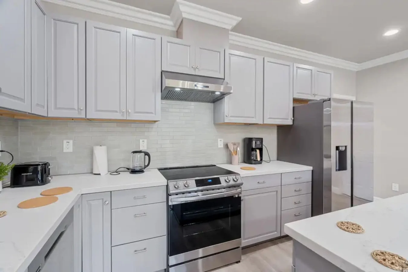 As you step into the kitchen, the clean lines and functional design make you eager to start cooking your favorite dishes.