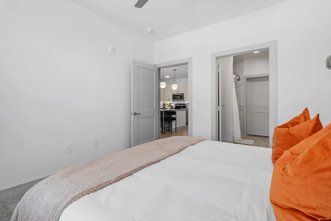 A restful haven with plush bedding and calming design details.