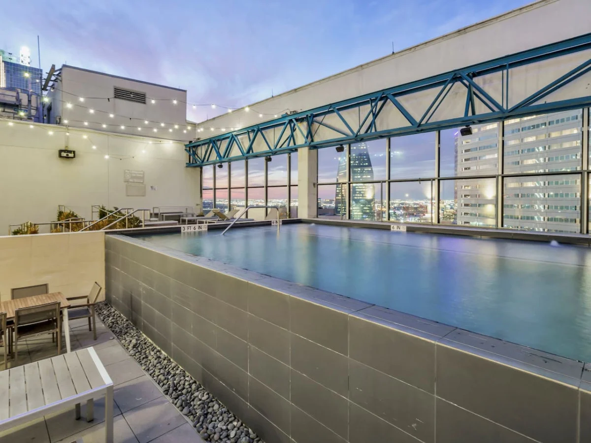 Sparkling private pool with lounge chairs and plenty of space to soak up the sun, ideal for lazy afternoons and refreshing dips.