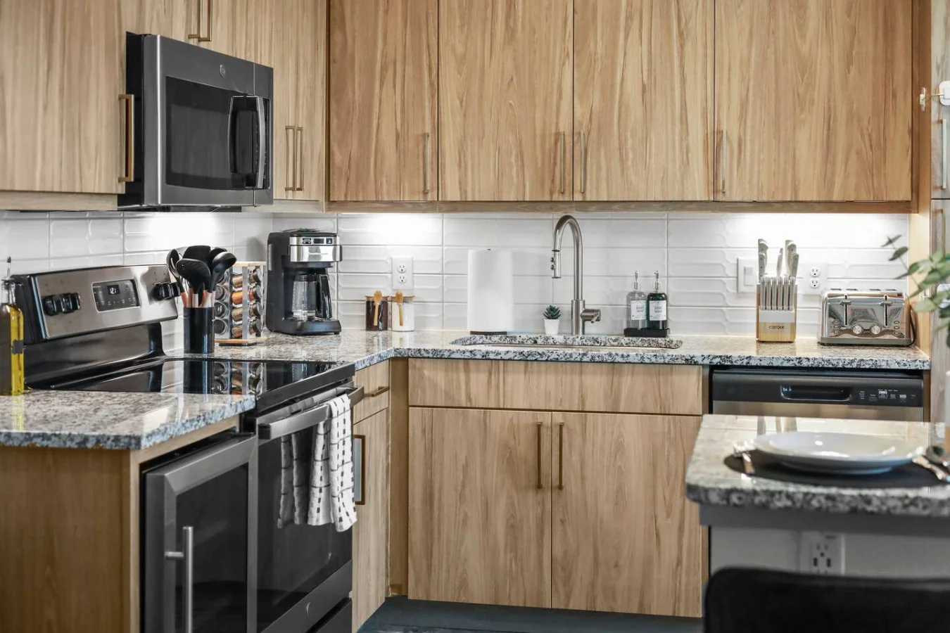 As you step into the kitchen, the clean lines and functional design make you eager to start cooking your favorite dishes.