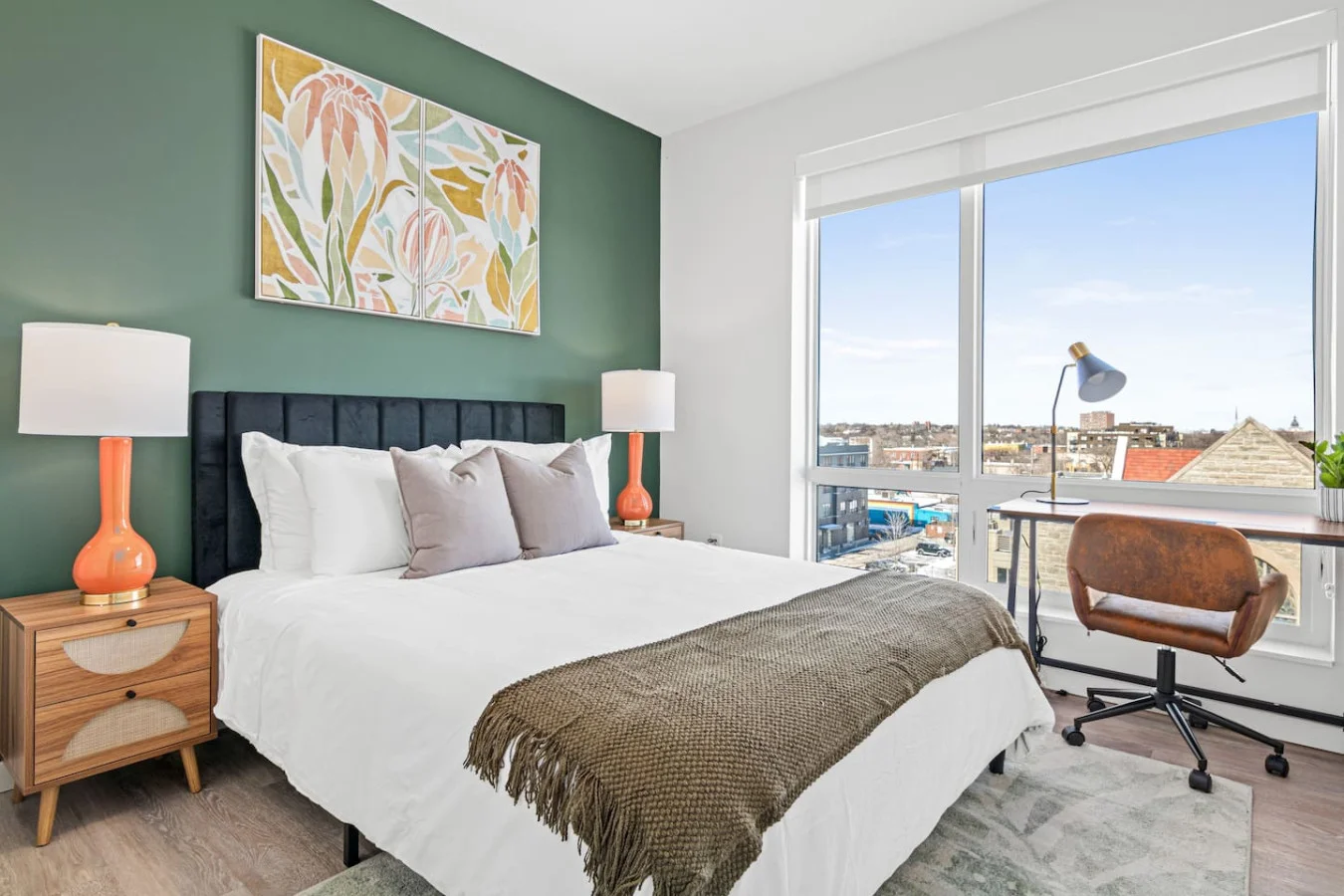 The bedroom’s serene ambiance invites you to relax, with a plush bed that promises a restful night's sleep.