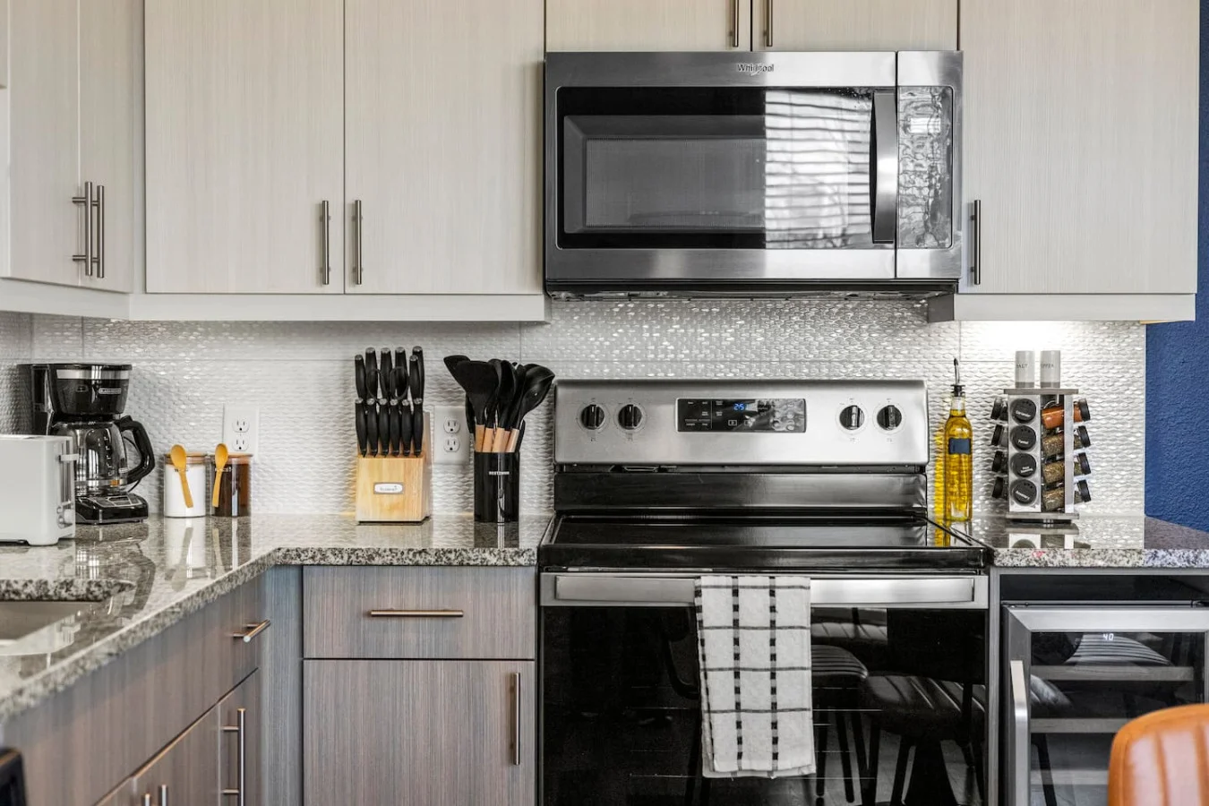 As you approach kitchen the elegant layout and well-stocked shelves make it the ideal spot to relax.