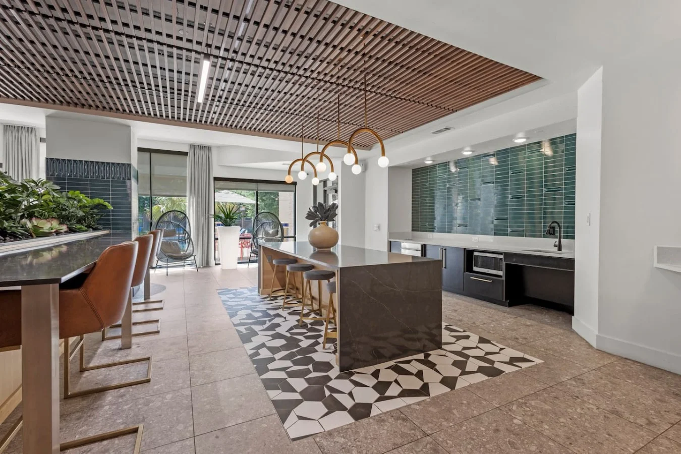 "Sip, stir, and connect in our sleek resident kitchen."