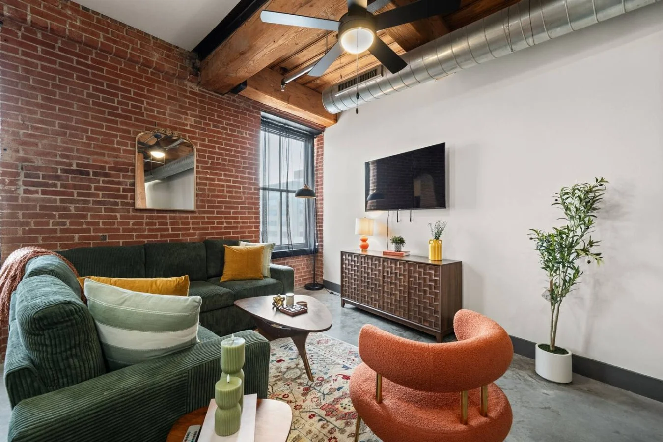 Spacious living room can accommodate up to 7 guests.