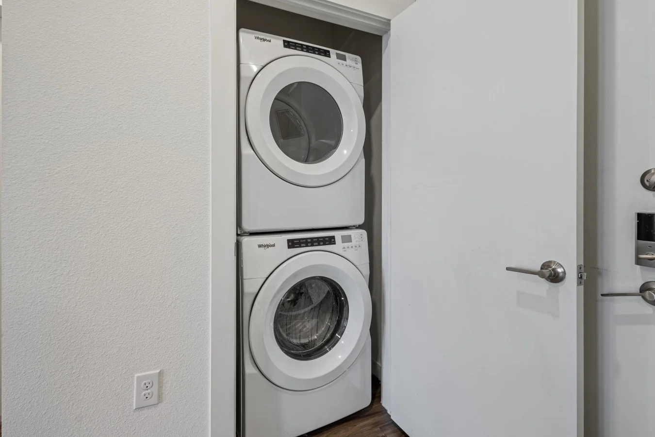 Enjoy the convenience of an in-unit Whirlpool washer and dryer tucked neatly in a laundry closet.