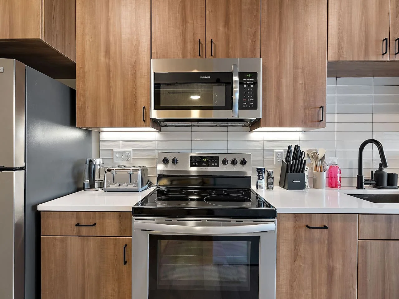 As you step into the kitchen, the clean lines and functional design make you eager to start cooking your favorite dishes.