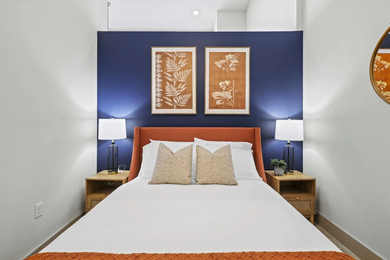 The bedroom offers a luxurious retreat, with a bed that promises restful nights and a room that feels like a private oasis.