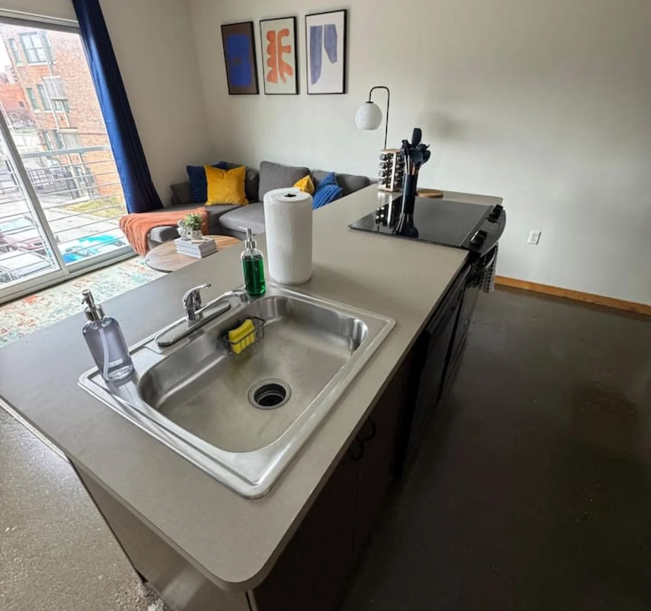 The kitchen’s open layout allows you to move freely as you prepare meals, with everything you need at your fingertips.