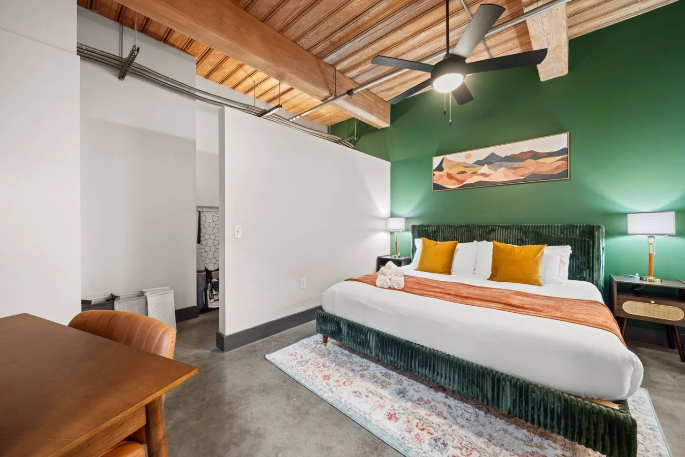 Spacious master suite equipped with cozy King-size bed; private desk/work-space and full bathroom directly off the bedroom. Walk in closet with ample storage space.