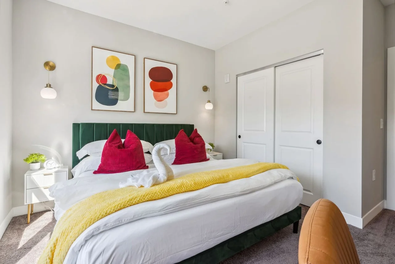 The king bed is the centerpiece of the room, offering a plush and inviting space where you can rest and recharge.