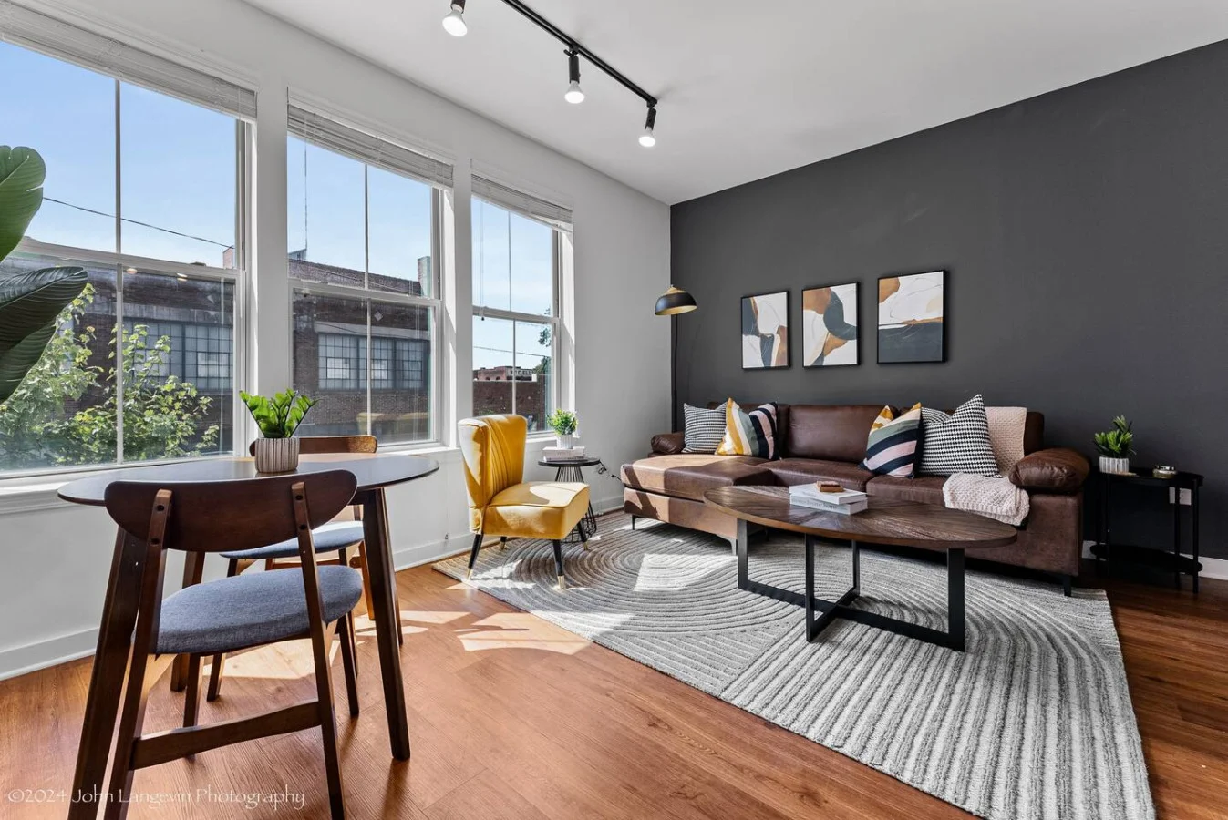 An open-concept area featuring a modern furnishings, and a stylish entertainment setup—ideal for gatherings and relaxation.