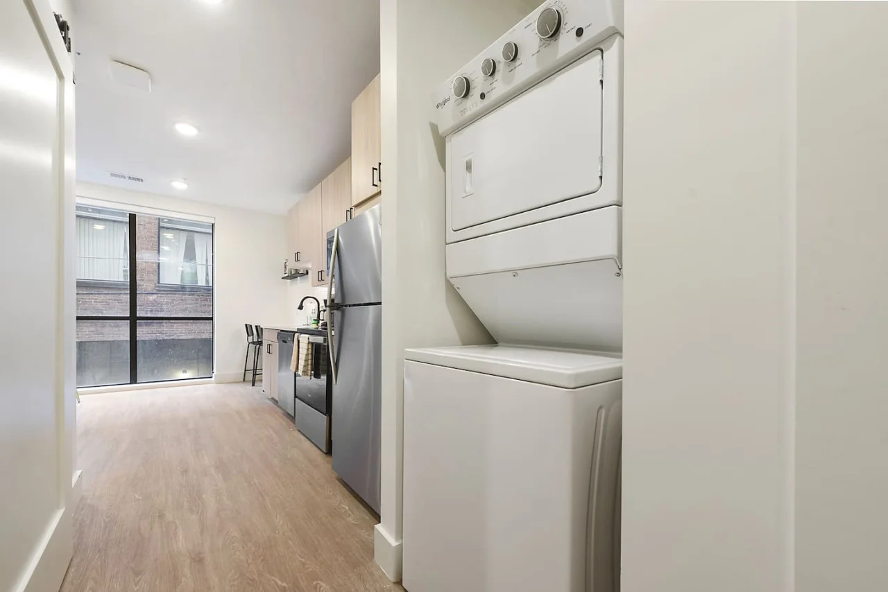 Convenient laundry room with washer, dryer, and all necessary supplies, making it easy to take care of your laundry needs.