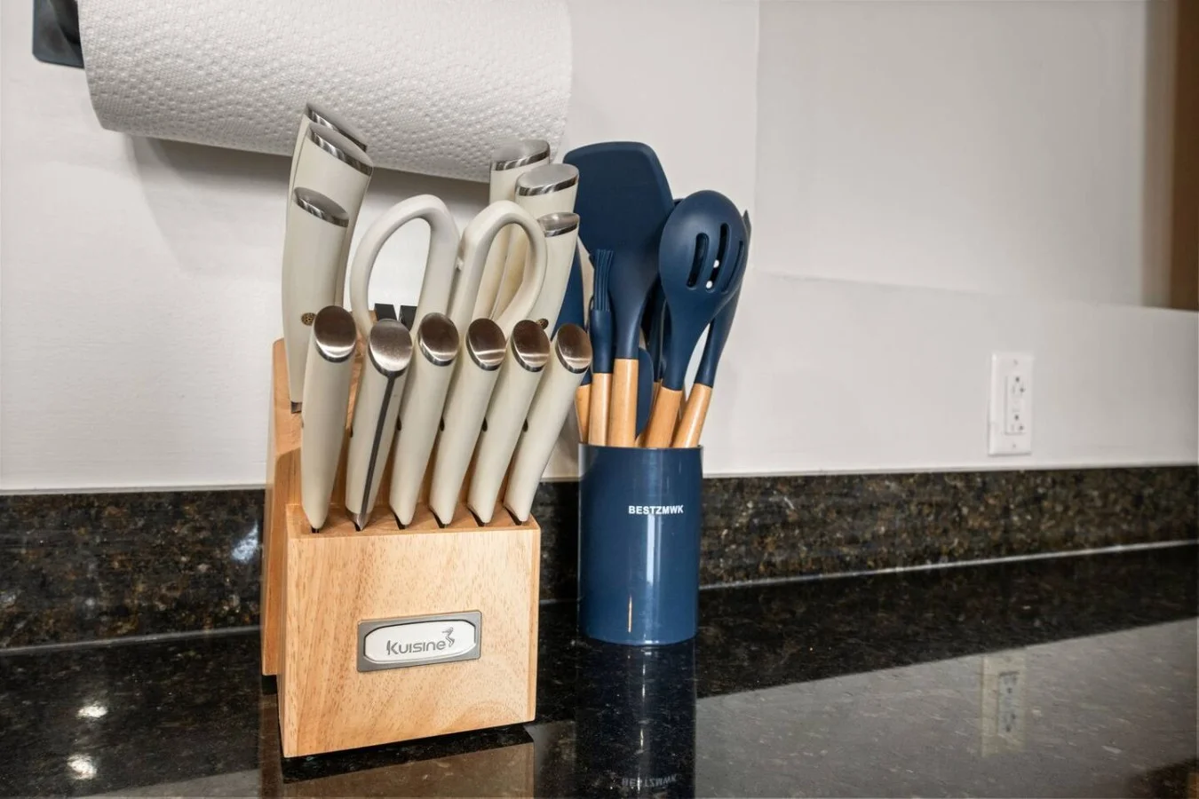Kitchen fully stocked with utensils.