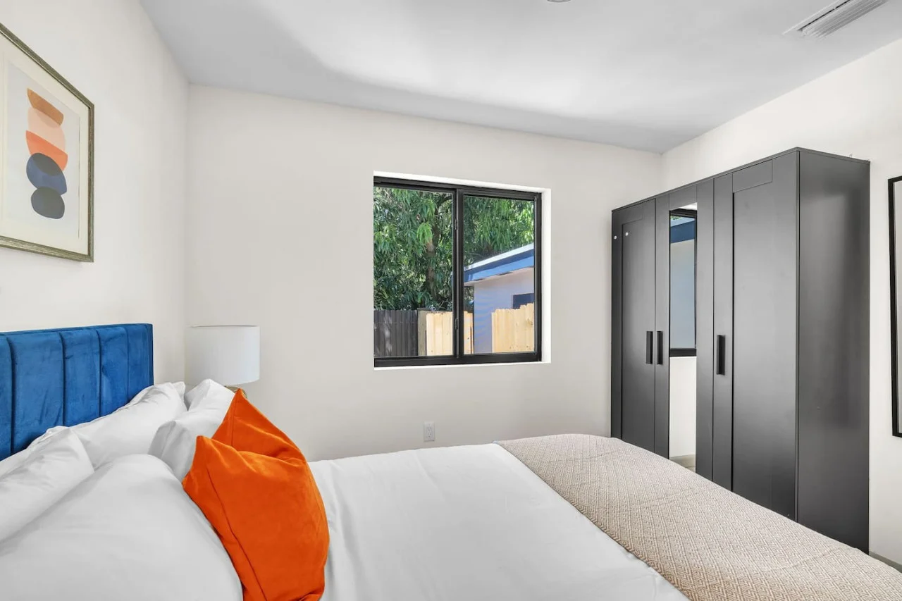 Sleek black wardrobes for functional storage.