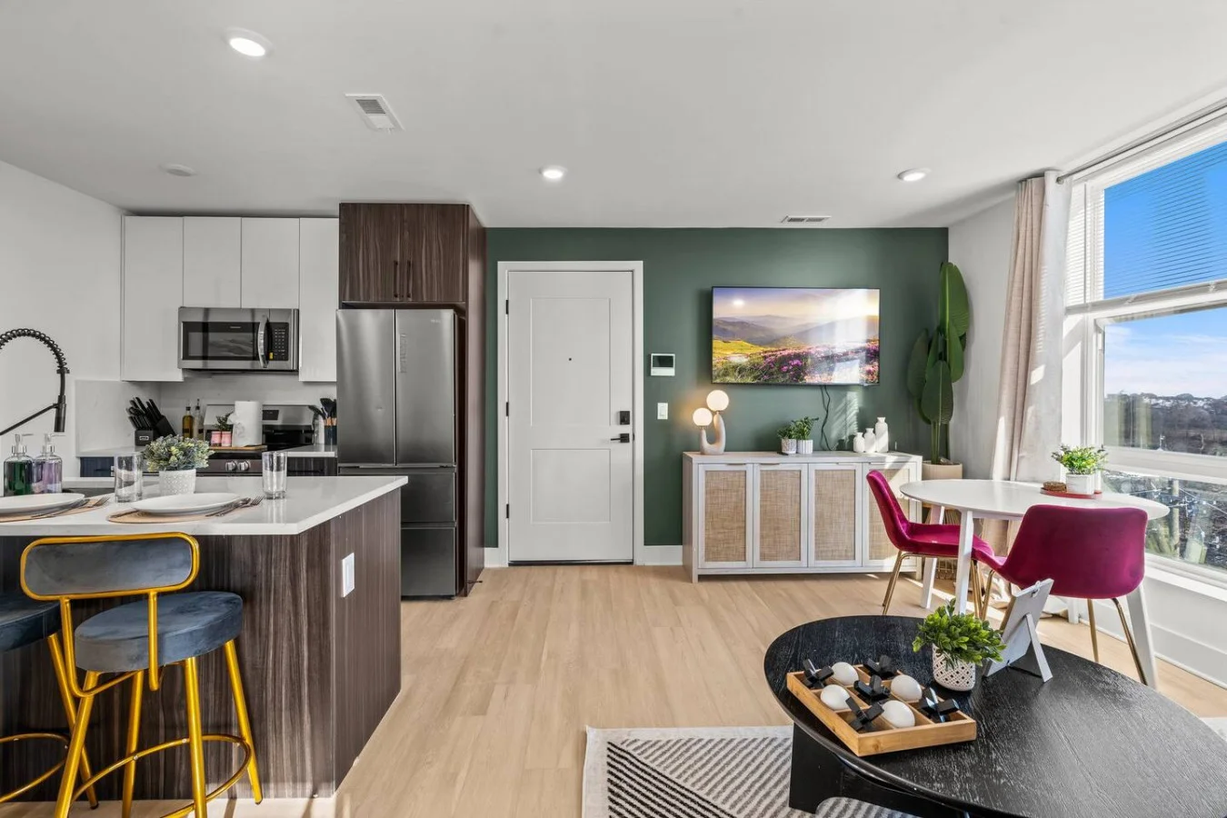 You feel a sense of peace as you step into the living room , with its inviting decor and soothing tones.