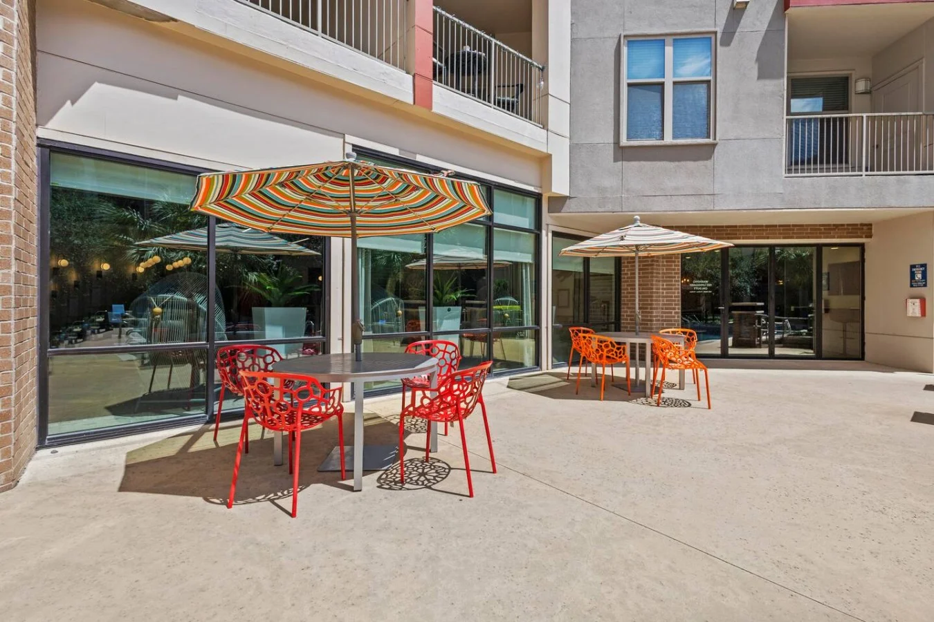 "Sun-soaked patio vibes and colorful courtyard conversations."