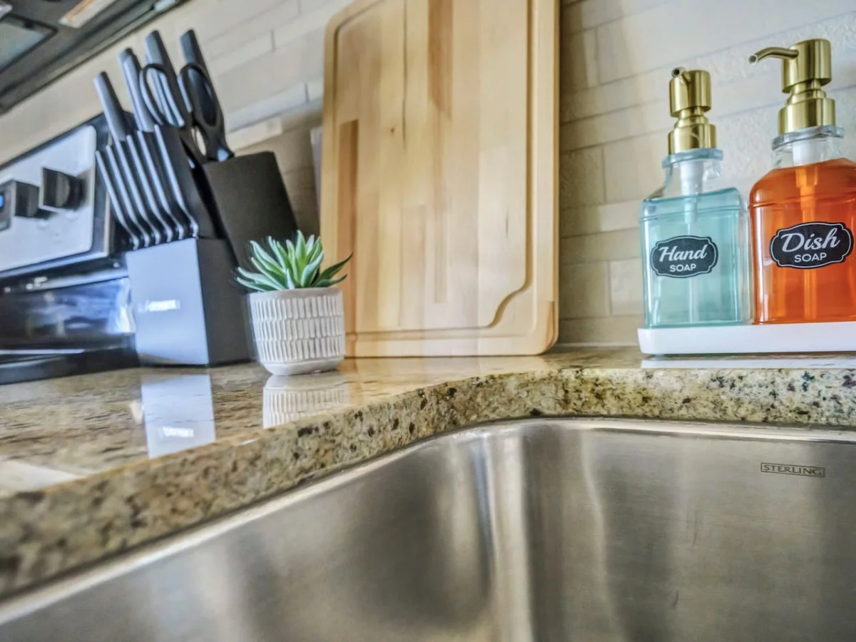 The kitchen’s open layout allows you to move freely as you prepare meals, with everything you need at your fingertips.
