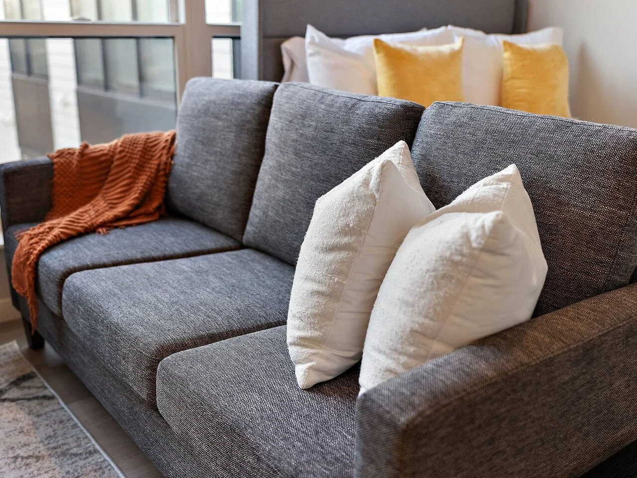 As you take a seat in the living room, the comfortable furniture and tasteful design make it easy to unwind.