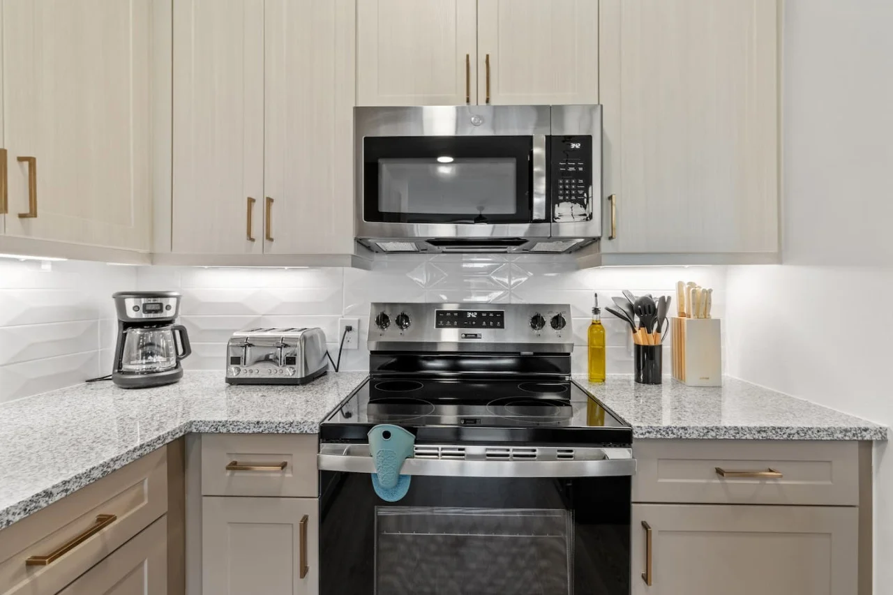 The kitchen invites you to experiment with new recipes, offering a stylish and practical space to cook and create.