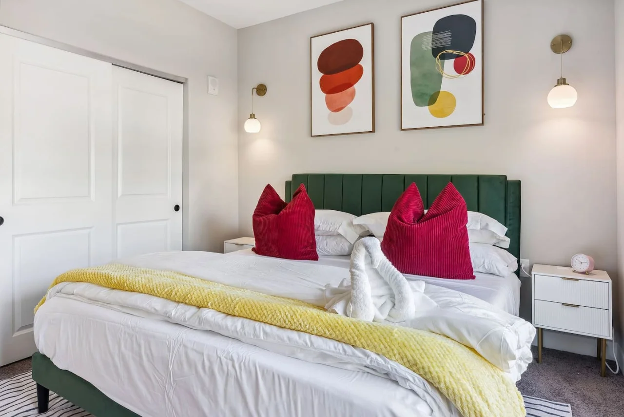 The king bedroom offers a luxurious retreat, with a bed that promises restful nights and a room that feels like a private oasis.