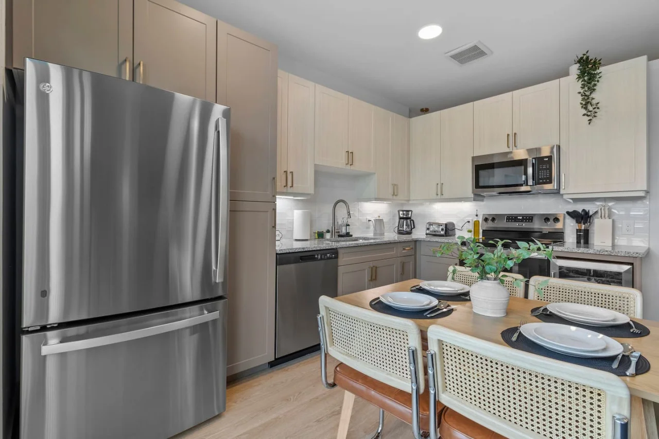 The dining area invites you to savor every moment, whether enjoying a quiet meal or hosting a festive gathering.