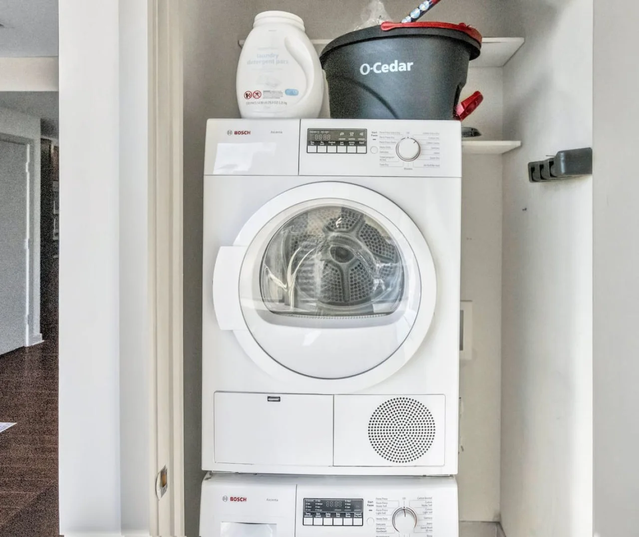 Convenient laundry room with washer, dryer, and all necessary supplies, making it easy to take care of your laundry needs.
