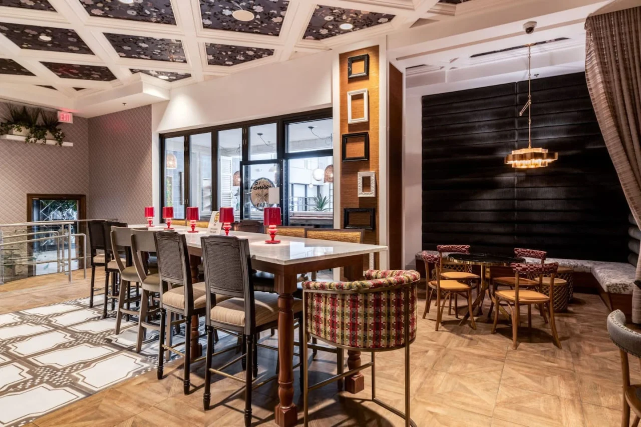 An open-concept area featuring a modern furnishings, and a stylish entertainment setup—ideal for gatherings and relaxation.