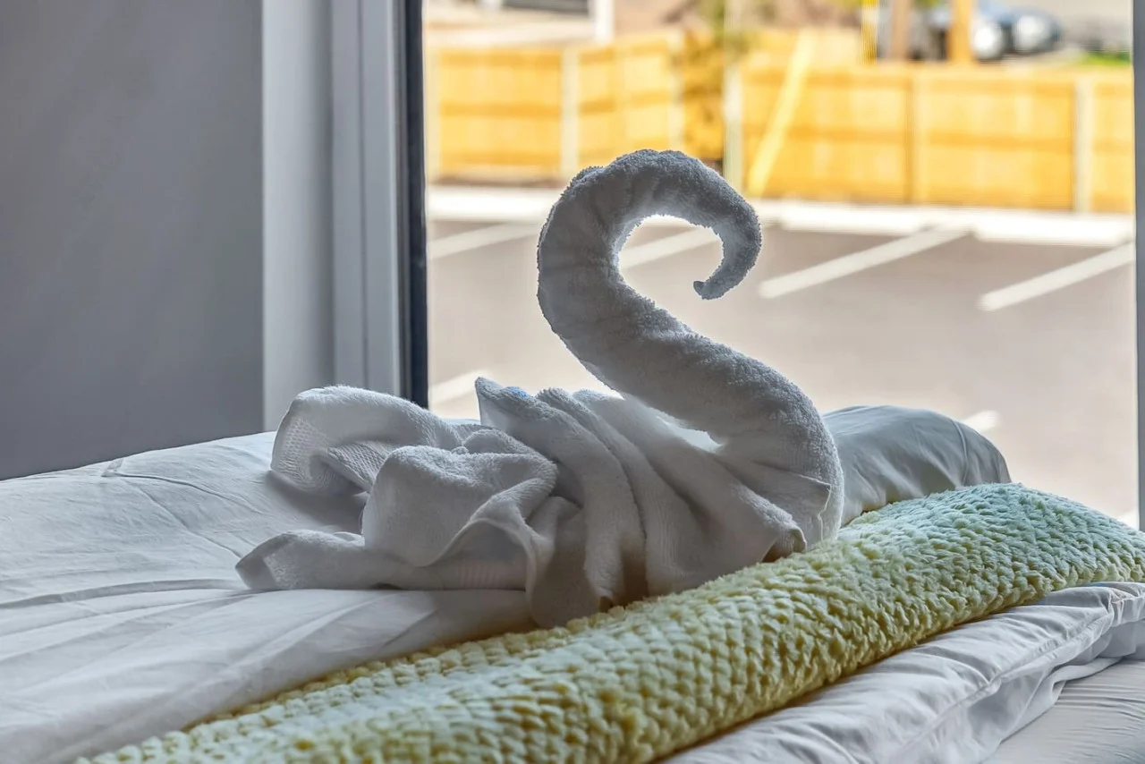 As you enter the king bedroom, the sophisticated decor and plush bedding create a space where you can truly unwind.