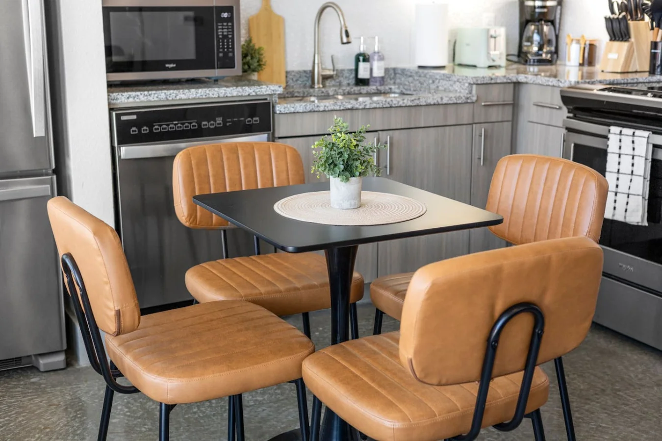 As you take your seat, the dining room's sophisticated design sets the stage for memorable meals and conversations.