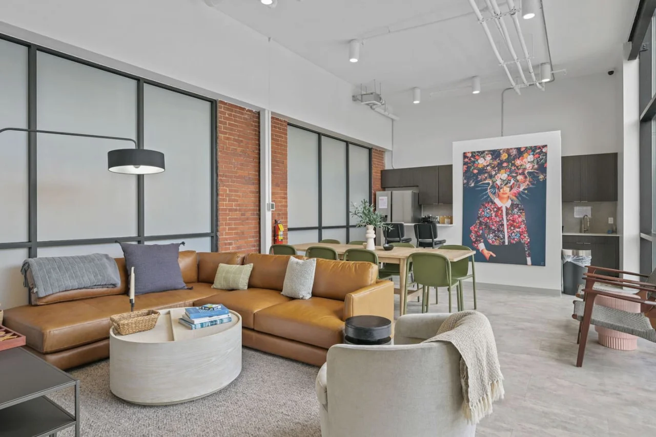 Relax in this warm, inviting space with wooden accents and cozy furnishings. You’ll love unwinding on the plush sofa, enjoying a good book or streaming your favorite shows in a serene atmosphere