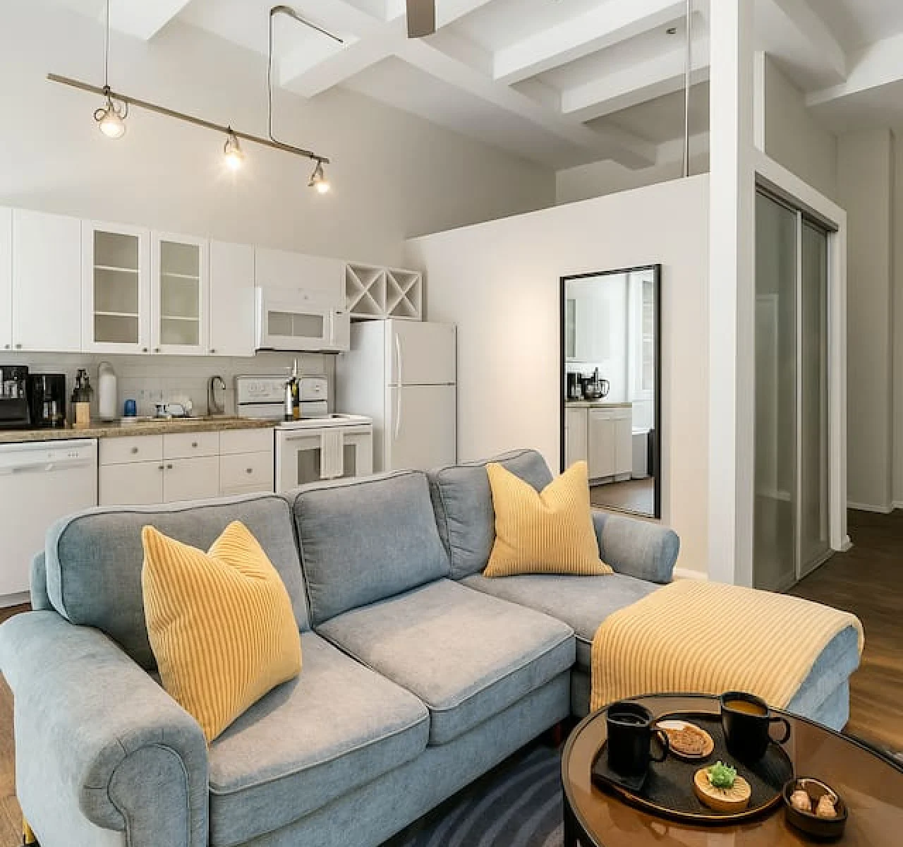 As you take a seat in the living room, the comfortable furniture and tasteful design make it easy to unwind.