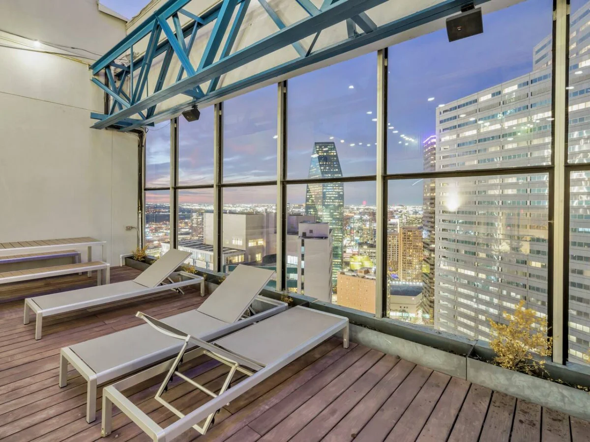 Soak in breathtaking sunsets and city skyline views from this expansive rooftop terrace. With ample seating and a vibrant atmosphere, it's the perfect spot to unwind and enjoy the beauty of Dallas at twilight.