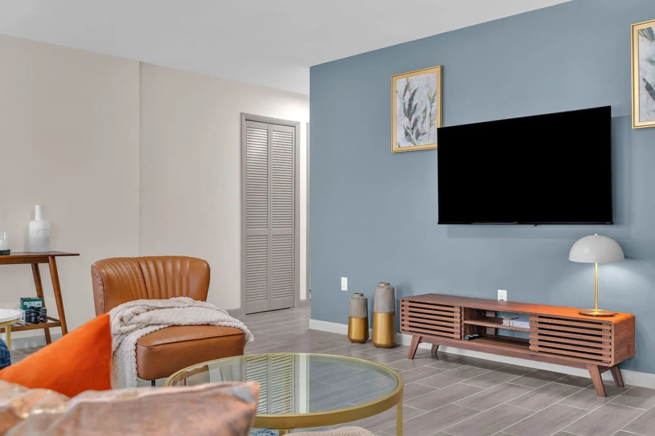 Relax in the living room and watch your favorite shows, lounging is a great way to unwind after a long day.