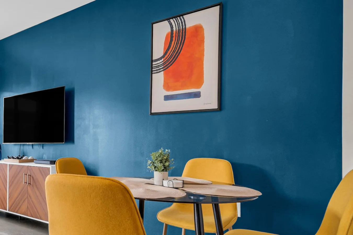 The dining area invites you to savor every moment, whether enjoying a quiet meal or hosting a festive gathering.