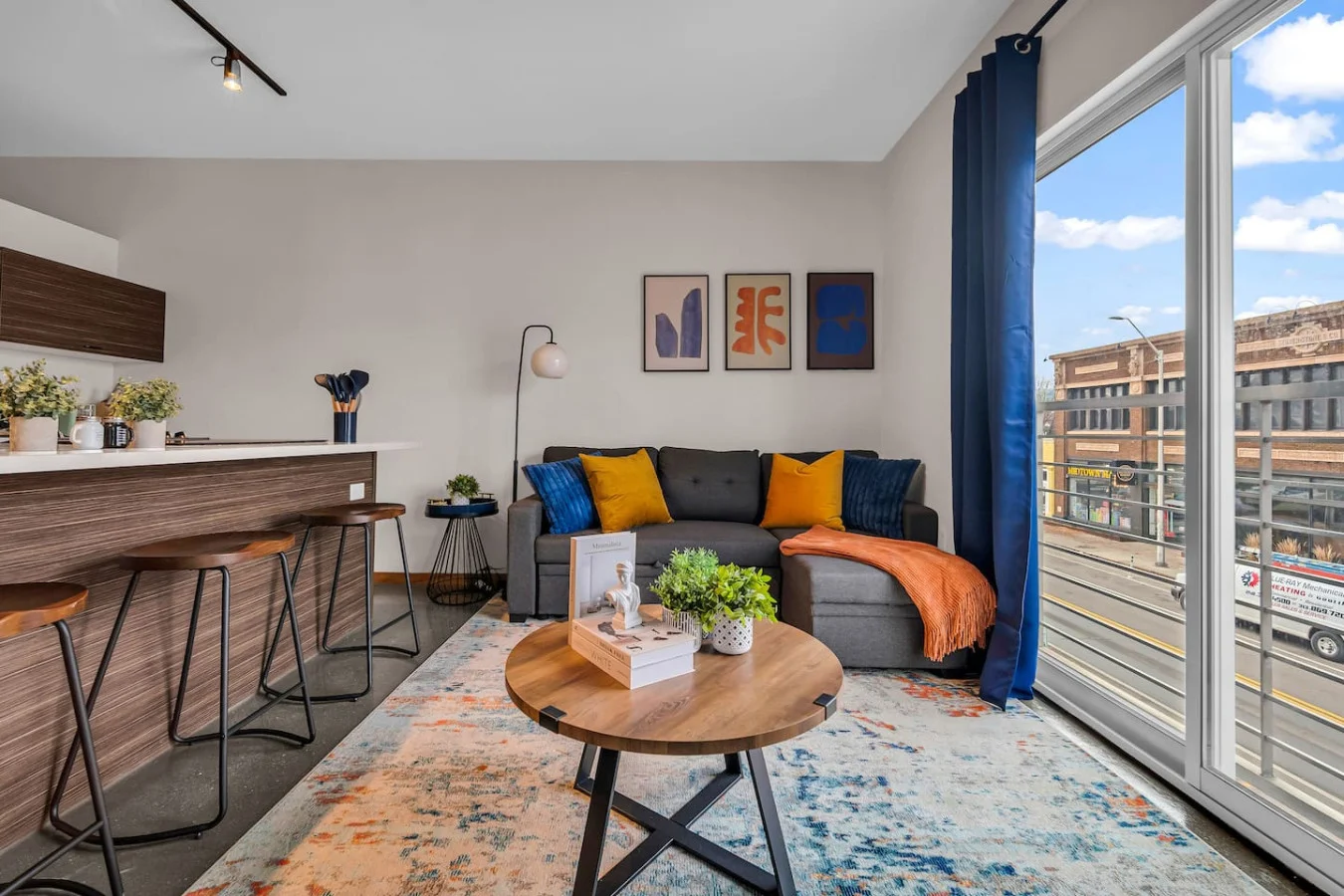 You feel at home as you settle into the living room, where the inviting atmosphere is perfect for lounging or entertaining.