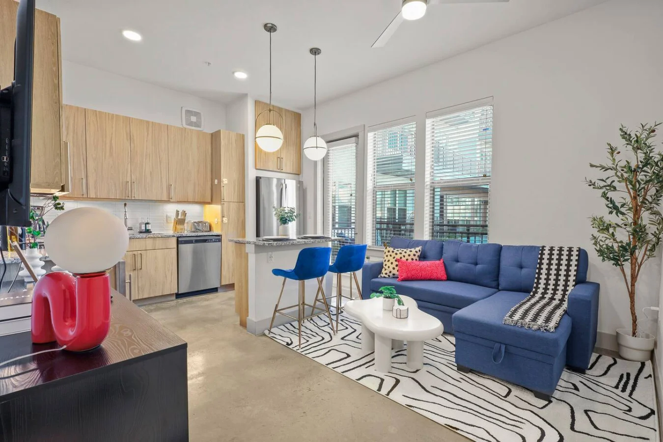 Relax in the living room and watch your favorite shows, lounging is a great way to unwind after a long day.