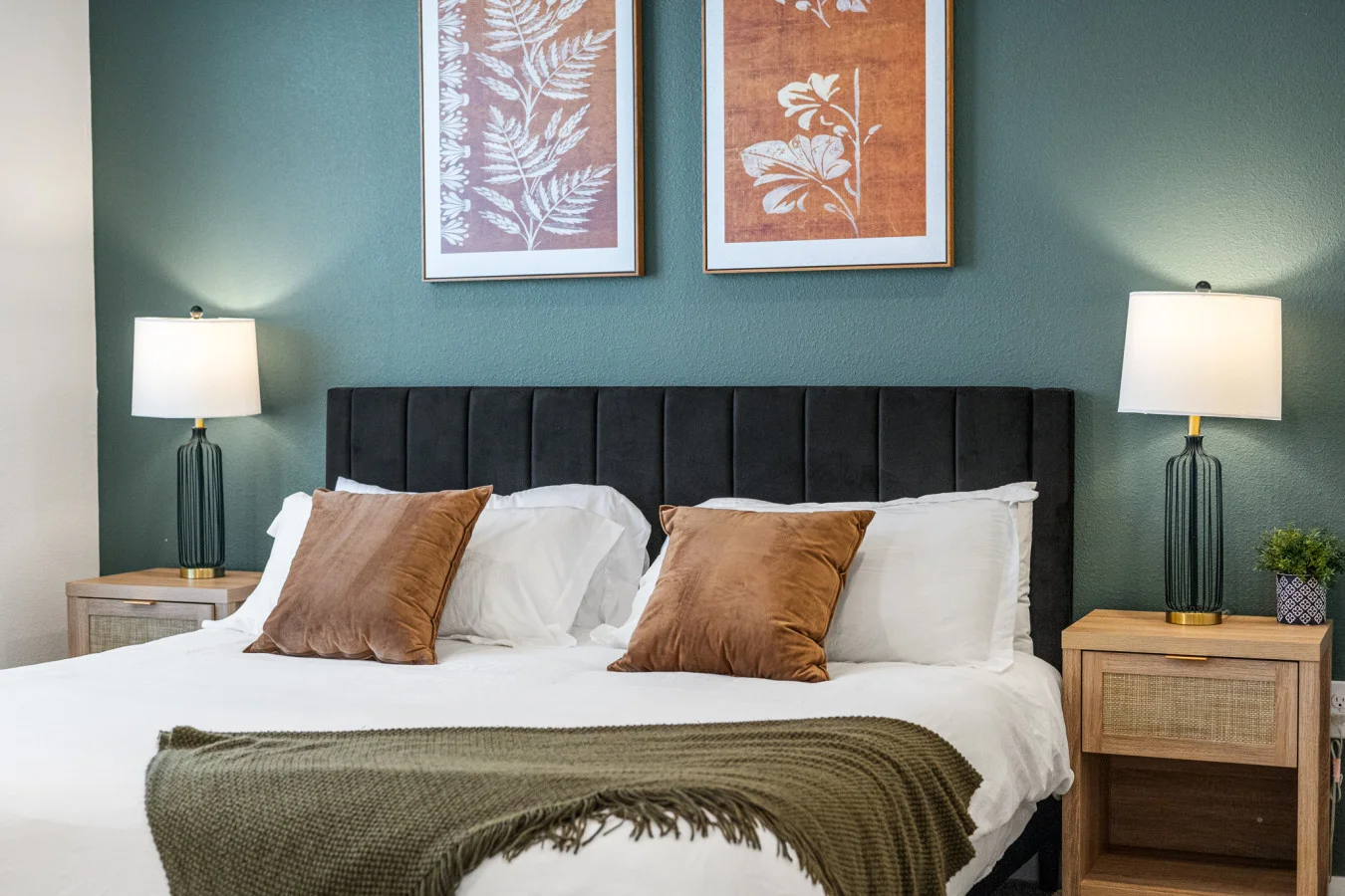 The bedroom’s serene ambiance invites you to relax, with a plush bed that promises a restful night's sleep.