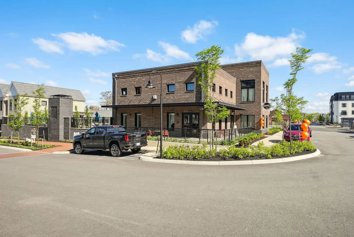 The outdoor area is a blend of modern and classic design elements, creating a welcoming and stylish facade.