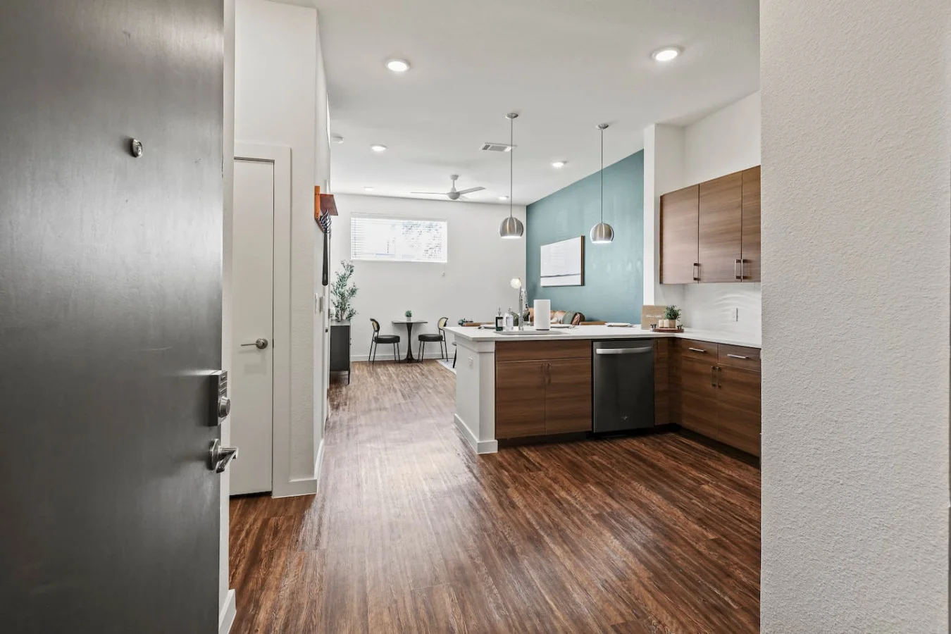 An open-concept area featuring a modern furnishings, and a stylish entertainment setup—ideal for gatherings and relaxation.