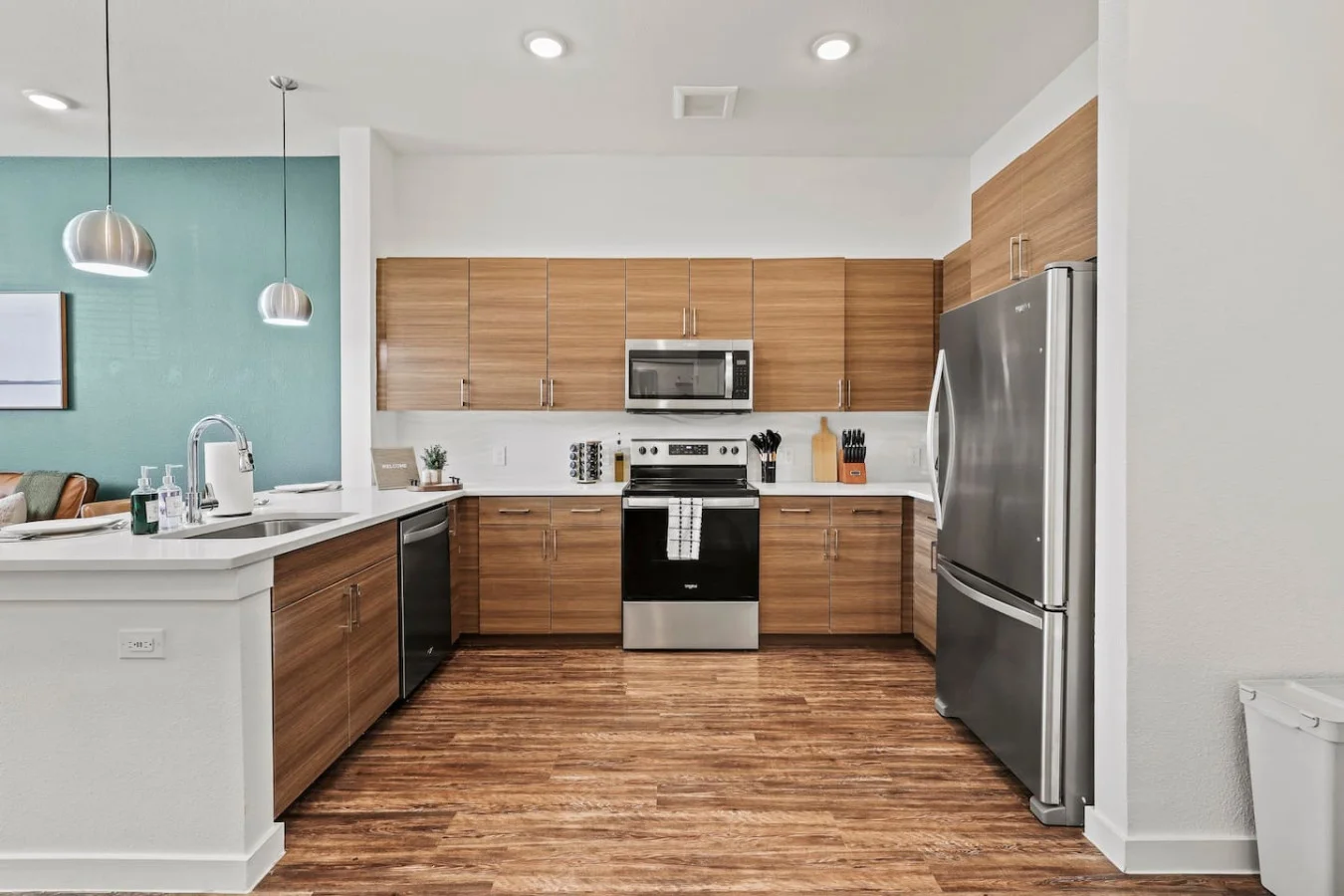 As you approach kitchen the elegant layout and well-stocked shelves make it the ideal spot to relax.