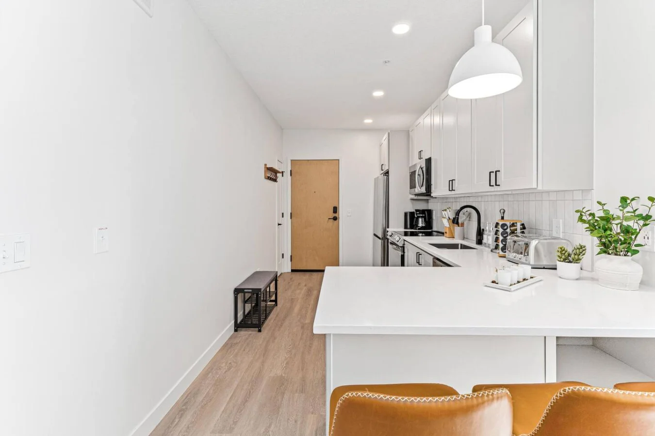 Home-cooked meals made effortless! Our bright, modern kitchen is ready for you with all the essentials so you can settle in fast.